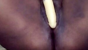 Ebony babe with natural tits sucks toys, squirts on chair, gets cumshot in detailed custom scene
