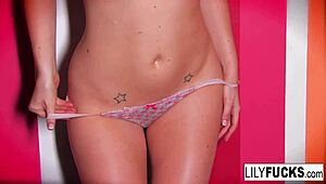 lily enjoys playing with her wet body