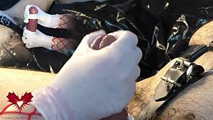 the mistress jerks my cock with white gloves, and i cum as she uses the dilator on my urethra