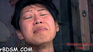 gagged and tied up girl gets her clit gratified in bondage domination