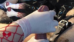 the mistress jerks my cock with white gloves, and i cum as she uses the dilator on my urethra