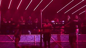 Young girl performs deepthroat and ass play at adult entertainment event
