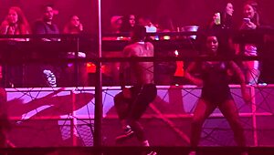 Young girl performs deepthroat and ass play at adult entertainment event