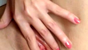 Amateur brunette fingers her tight pink pussy in stockings