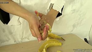 Japanese handjob crushes messy banana in fetish food play