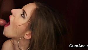 kinky doll gets a messy cum shot right on her face, gulping it all!