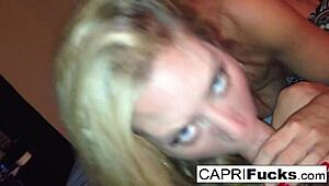 Capri Cavanni uses a hitachi to get herself off, stroking her big tits and pussy