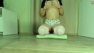 Hey, watch this cute girl finger her wet pussy with a huge dildo on cam!