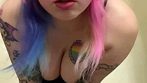 alice bangz is in the bathroom, cleaning up as a maid with her tattoo showing