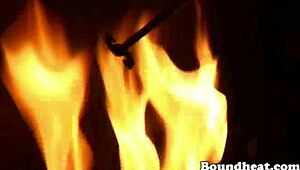 the handcuffed blonde slave eats her mistress's pussy and dances desperately for freedom in this bdsm scene