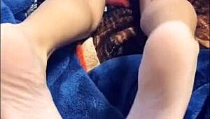 exotic beautiful teen gives footjob on webcam