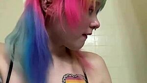 alice bangz is in the bathroom, cleaning up as a maid with her tattoo showing