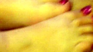 my wife gives a hot footjob with pink toenails and cumshot