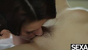 Busty lesbians engage in 69 licking and fingering to mutual orgasm