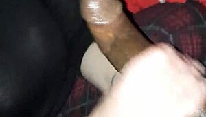 Stroking that massive black cock hard