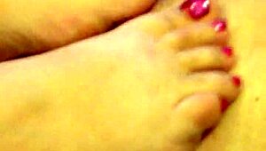 my wife gives a hot footjob with pink toenails and cumshot