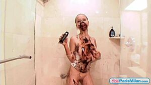 Teen Paris Milan smears chocolate over her sexy body