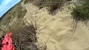 Suzisoumise turns into a public beach whore. Watch her flash and fuck outdoors!