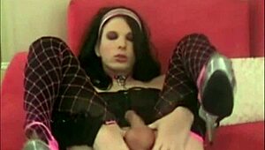 Watch This Webcam Shemale In Crossdressing Gear Giving Herself A Blowjob