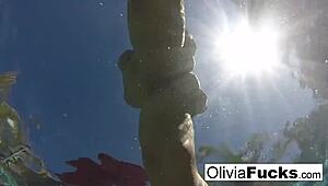 olivia enjoys summer pool fun with her big tits exposed