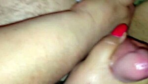 Red nail wife teases cock with handjob, no cumshot