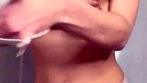 the hot student caressed her big natural tits in a homemade reality scene