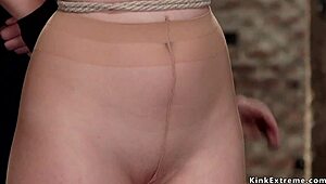 Hey, watch this shaved blonde take a tight crotch rope!