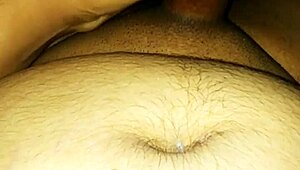 Gay guy cumming inside the condom during intense sex