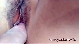 Wow, check this hairy Asian pussy getting fucked up close! 😍