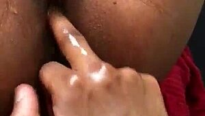 Ebony teen squirts during intense fingering!