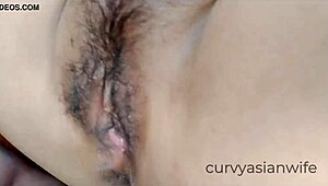Wow, check this hairy Asian pussy getting fucked up close! 😍