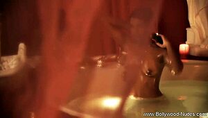 Her Bronze Skin Shines While She Teases and Strips