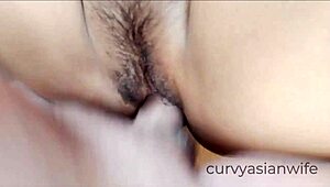 Wow, check this hairy Asian pussy getting fucked up close! 😍