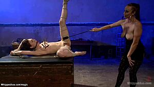 busty dominatrix whips bound lesbian with assfucking and gagging