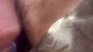 Exploring Sensations With A Large Purple Toy In A Tight Space