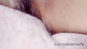 Wow, check this hairy Asian pussy getting fucked up close! 😍