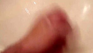 guy strokes his big monster cock slowly