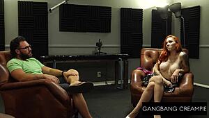 Hey, that redhead babe is diving into a wild gangbang creampie session