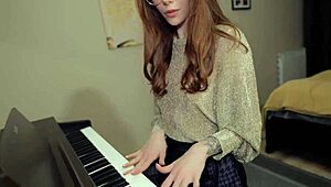 Redhead Teen Unleashes Passion in Sensual Miniskirt