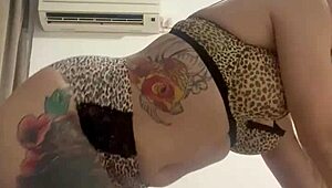 Beautiful teen in lingerie teases with sexy moves and tattoo