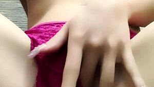 Teen with big breasts pleasures herself close-up