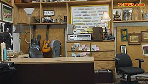 woman with glasses boned at the pawnshop