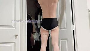 A petite Asian girl with impressive muscle strength performs regular and weighted pull-ups in the gym