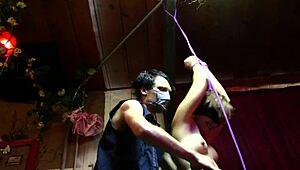 Inked babe in miniskirt gets tied and tickled topless