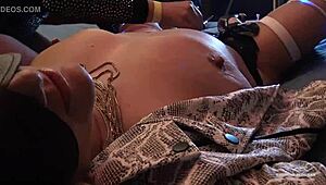 Hot blonde engages in swingers foursome activity with bondage elements