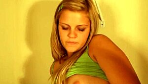 Young blonde amateur indulges in rough self-pleasure and nude striptease