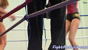 athletic babe wrestling with another in a match