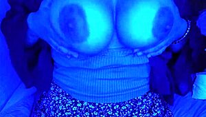 Rgb light blowjob by busty Asian with massive cumshot on boobs