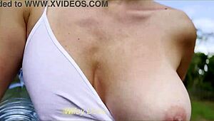 Randy wife flashes big tits in daring public walk