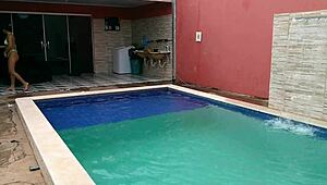 Pregnant girl enjoys lesbian sex in the pool